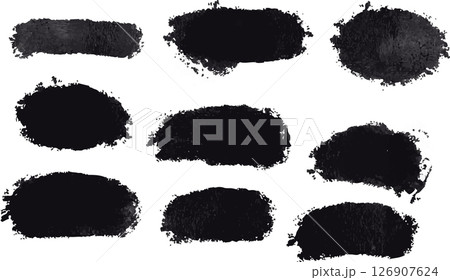 Black Ink Brush Stroke. Isolated on White Background. A bold black brush stroke with rough texture, isolated on a white background. 126907624