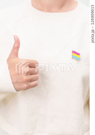 Pansexual Visibility Day and Panromantic May Awareness Day and LGBT pride month concept. hand holding pink, yellow and blue heart shape for Lesbian, Gay, Bisexual, Transgender and Marriage Equality 126909015