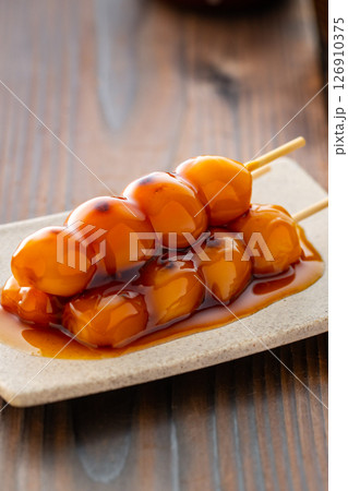 Grilled Mitarashi Dango with Sweet Soy Glaze Grilled Mitarashi Dango with Sweet Soy Glaze 126910375