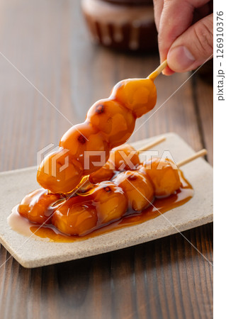 Grilled Mitarashi Dango with Sweet Soy Glaze Grilled Mitarashi Dango with Sweet Soy Glaze 126910376