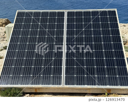 Alternative types of electricity generation, solar panels, wind power generation. Electricity production system from natural sources, renewable energy. 126913470