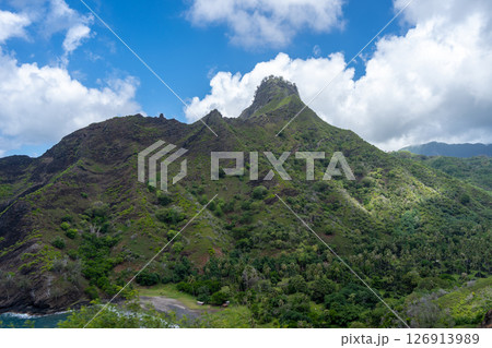 Lush green mountains along the road to Puamau, Hiva Oa, Marquesas Islands, French Polynesia Lush green mountains along the road to Puamau, Hiva Oa, Marquesas Islands, French Polynesia 126913989