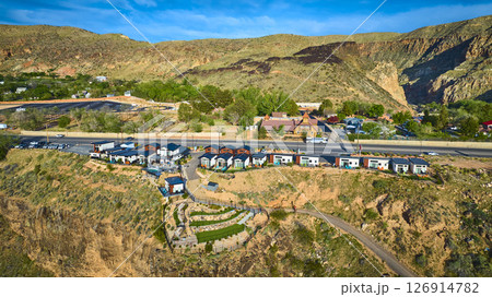 Aerial Modern Cliffside Homes and Historic Lodge by Desert Hills Fly Through 126914782