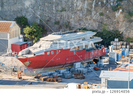 Large yacht under construction in shipyard, photo Large yacht under construction in shipyard, photo 126914856