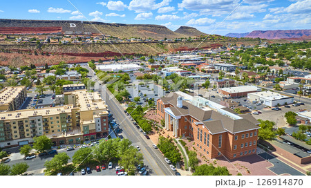 Aerial Downtown St George Courthouse and Apartments with Red Rock Cliffs Fly Over Aerial Downtown St George Courthouse and Apartments with Red Rock Cliffs Fly Over 126914870