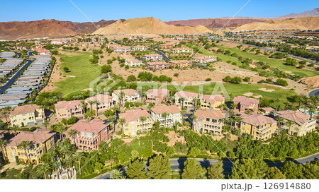 Aerial Upscale Golf Course Community with Desert Mountains Lake Las Vegas 126914880