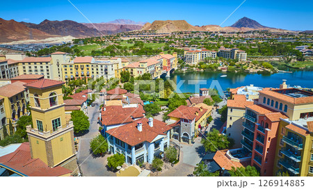 Aerial Vibrant Mediterranean Resort Town by Lake Las Vegas with Desert Mountains 126914885