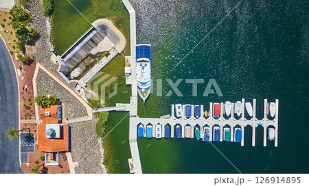 Aerial Marina Boats and Palm Trees Over Deep Blue Water Top Down Aerial Marina Boats and Palm Trees Over Deep Blue Water Top Down 126914895