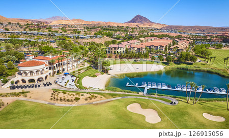 Aerial Luxury Golf Clubhouse Lake and Desert Villas Flyover Aerial Luxury Golf Clubhouse Lake and Desert Villas Flyover 126915056