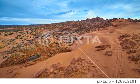 Aerial Fly Over Red Sandstone Dunes and Desert Tracks in Hurricane Utah 126915101