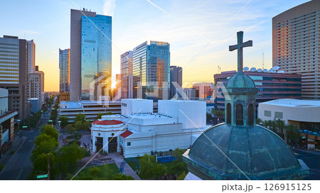Aerial Downtown Phoenix Skyscrapers and Historic Church Dome at Sunset Fly Over 126915125