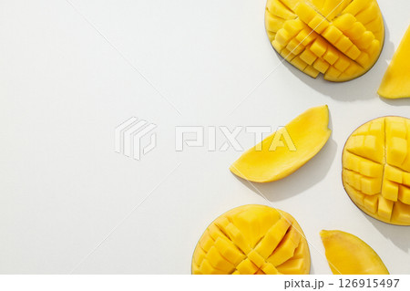 Ripe sliced mango on a white background 126915497