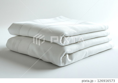 Textiles for Grand hotel. Egyptian cotton sheets on a white background. Stack of high-thread-count white sheets. 126916573