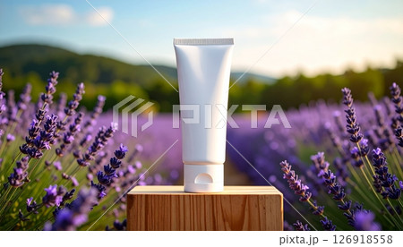 White lotion cream bottle on wooden podium lavender field background 126918558