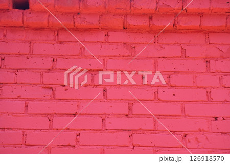 Old red brick wall painted with fresh paint. Brickwork with uneven seams texture Old red brick wall painted with fresh paint. Brickwork with uneven seams texture 126918570