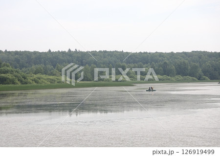 panoramic lake landscape. Nature view on beautiful lake with green trees.. 126919499