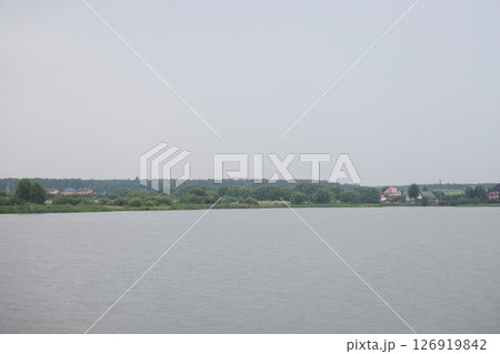panoramic lake landscape. Nature view on beautiful lake with green trees.. panoramic lake landscape. Nature view on beautiful lake with green trees.. 126919842