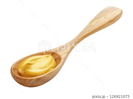 Wooden spoon with mustard 126921075