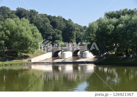 View of the pond and Tsaritsynsky park on a sunny summer day, Moscow, Russia, July 2022. 126921367