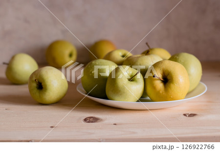 Apples of bright green color add freshness to the composition Apples of bright green color add freshness to the composition 126922766
