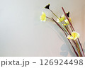 fake flowers yellow  on cream background 126924498