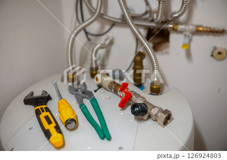 Tools Ready for Water Heater Plumbing Repair Tools Ready for Water Heater Plumbing Repair 126924803