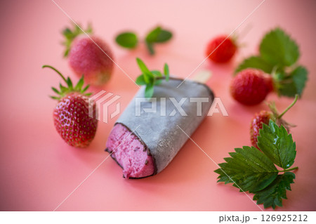 Refreshing ice cream with strawberries and mint leaves Refreshing ice cream with strawberries and mint leaves 126925212
