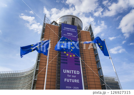 Waving EU flags in front of the Berlaymont building headquarters of the European Commission on May 20, 2025 in Brrussels, Belgium. Waving EU flags in front of the Berlaymont building headquarters of the European Commission on May 20, 2025 in Brrussels, Belgium. 126927315