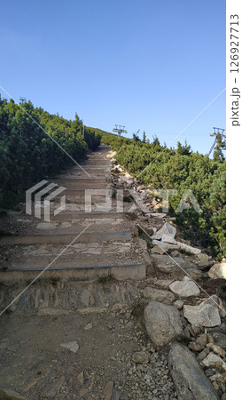 Hiking trail leading to snezka mountain peak in czech republic in august 126927713