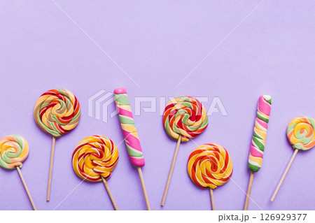 Set of colorful lollipops on colored background. Summer concept. Party Happy Birthday or Minimalist Concept 126929377