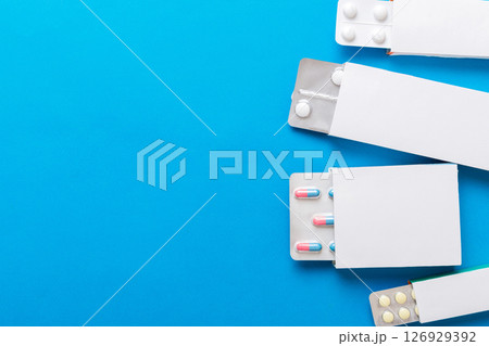 Blank White Product Package Box Mock-up. Open blank medicine drug box with blister top view Blank White Product Package Box Mock-up. Open blank medicine drug box with blister top view 126929392