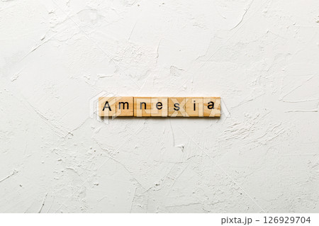 amnesia word written on wood block. amnesia text on table, concept amnesia word written on wood block. amnesia text on table, concept 126929704