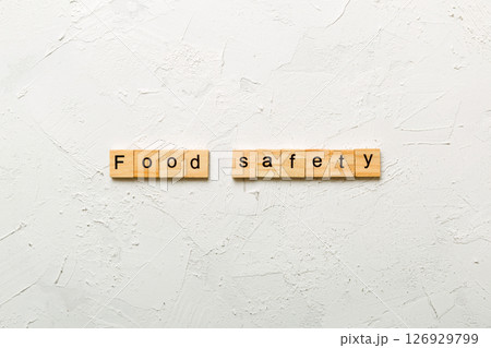 food safety word written on wood block. food safety text on table, concept food safety word written on wood block. food safety text on table, concept 126929799