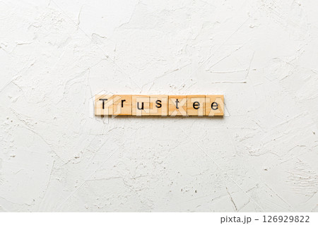 trustee word written on wood block. trustee text on table, concept 126929822