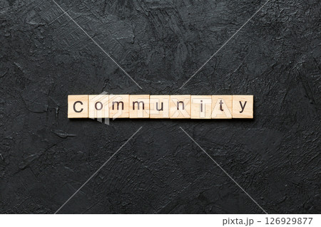 Community word written on wood block. Community text on table, concept Community word written on wood block. Community text on table, concept 126929877