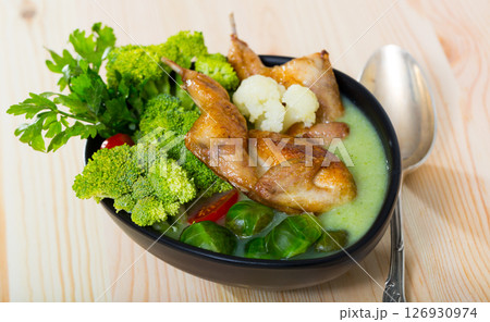 Cabbage soup with quails and greens Cabbage soup with quails and greens 126930974