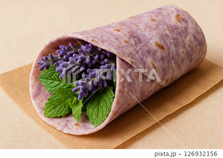 Creative fast food wrap featuring unusual non food ingredients including purple flowers and green leaves in a colorful tortilla, AI Generative 126932156