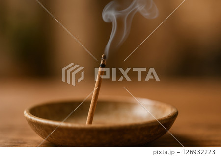 Orthodox religious incense burning in ceramic holder, rising fragrant smoke during ritual symbolizing purification and spiritual tradition, AI Generative 126932223