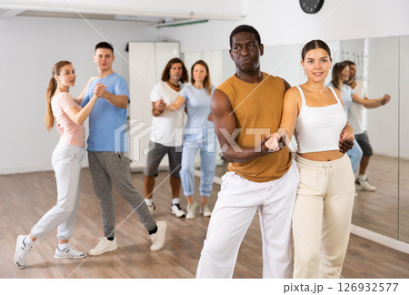 Young female and adult male dancing pair dance Young female and adult male dancing pair dance 126932577