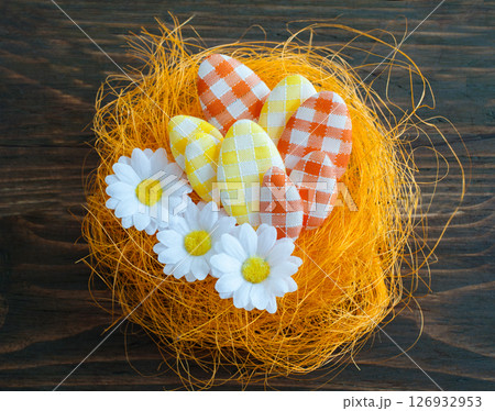 Easter eggs in an artificial nest 126932953