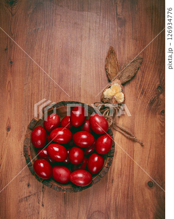 painted eggs in a wooden bowl, red, painted madder dye, powder from the roots of endro, with onion husks, top view, Easter, Georgia, painted eggs in a wooden bowl, red, painted madder dye, powder from the roots of endro, with onion husks, top view, Easter, Georgia, 126934776