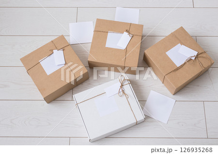Many boxes with space for advertisement delivered from online store. Internet shopping and delivery concept. Mockup 126935268