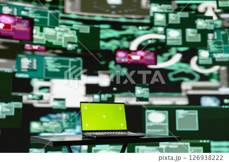 Empty scene with green screen on laptop showcases quantum threat on the dark web, space for a cyber crime with system override and identity theft. Cracking passwords to steal data. 126938222