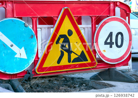 Road works. Road signs. Detour, speed limit 126938742