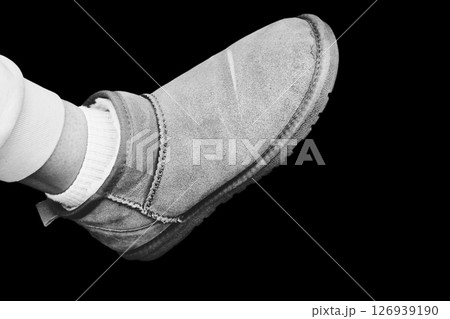 Black white women legs in warm ugg boots 126939190