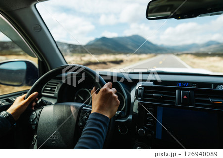 Driving offroad car on high elevation mountains 126940089