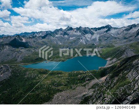 Aerial view of beautiful high altitude mountain and lake landscape Aerial view of beautiful high altitude mountain and lake landscape 126940149