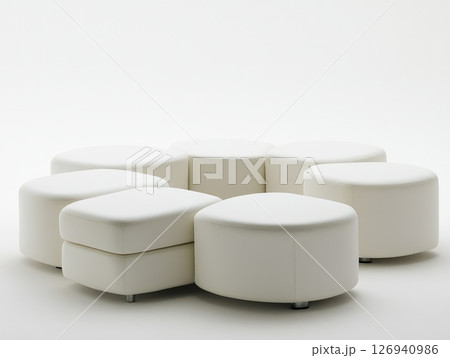 Circular arrangement of white ottoman seats on a white background 126940986