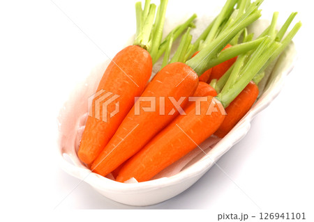 fresh carrots isolated on white background fresh carrots isolated on white background 126941101