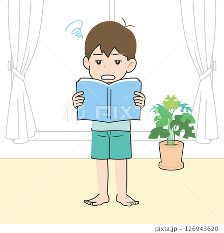 居間でいやいや教科書を音読する男の子 居間でいやいや教科書を音読する男の子 126943620